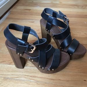 Brown and black strapped heels
